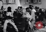Image of anarchy in Cuba between Batista exit and Castro arrival Havana Cuba, 1959, second 25 stock footage video 65675033308