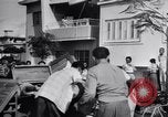 Image of anarchy in Cuba between Batista exit and Castro arrival Havana Cuba, 1959, second 28 stock footage video 65675033308