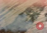 Image of American P-47s strafe coastal town in Japan Kagoshima Kyushu Japan, 1945, second 1 stock footage video 65675033362