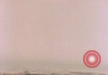Image of American P-47s strafe coastal town in Japan Kagoshima Kyushu Japan, 1945, second 35 stock footage video 65675033362
