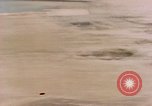 Image of American P-47s strafe coastal town in Japan Kagoshima Kyushu Japan, 1945, second 38 stock footage video 65675033362