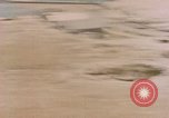 Image of American P-47s strafe coastal town in Japan Kagoshima Kyushu Japan, 1945, second 39 stock footage video 65675033362