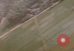 Image of American P-47s strafe coastal town in Japan Kagoshima Kyushu Japan, 1945, second 57 stock footage video 65675033362
