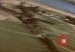 Image of American P-47s strafe coastal town in Japan Kagoshima Kyushu Japan, 1945, second 60 stock footage video 65675033362
