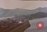 Image of American P-47 aircraft strafe targets in Japan Kagoshima Kyushu Japan, 1945, second 15 stock footage video 65675033363