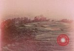 Image of American aircraft strafing Japanese targets at end of war Kagoshima Kyushu Japan, 1945, second 1 stock footage video 65675033366