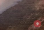 Image of American aircraft strafing Japanese targets at end of war Kagoshima Kyushu Japan, 1945, second 13 stock footage video 65675033366