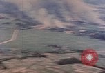 Image of American aircraft strafing Japanese targets at end of war Kagoshima Kyushu Japan, 1945, second 18 stock footage video 65675033366