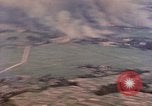 Image of American aircraft strafing Japanese targets at end of war Kagoshima Kyushu Japan, 1945, second 19 stock footage video 65675033366