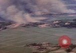 Image of American aircraft strafing Japanese targets at end of war Kagoshima Kyushu Japan, 1945, second 24 stock footage video 65675033366