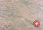 Image of American aircraft strafing Japanese targets at end of war Kagoshima Kyushu Japan, 1945, second 46 stock footage video 65675033366