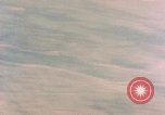 Image of American aircraft strafing Japanese targets at end of war Kagoshima Kyushu Japan, 1945, second 52 stock footage video 65675033366