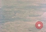 Image of American aircraft strafing Japanese targets at end of war Kagoshima Kyushu Japan, 1945, second 55 stock footage video 65675033366