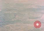 Image of American aircraft strafing Japanese targets at end of war Kagoshima Kyushu Japan, 1945, second 56 stock footage video 65675033366