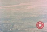 Image of American aircraft strafing Japanese targets at end of war Kagoshima Kyushu Japan, 1945, second 57 stock footage video 65675033366