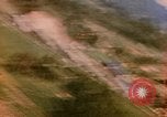 Image of Strafing Japanese targets in  Kagoshima prefecture Kagoshima Kyushu Japan, 1945, second 17 stock footage video 65675033367