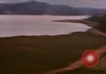 Image of Strafing Japanese targets in  Kagoshima prefecture Kagoshima Kyushu Japan, 1945, second 25 stock footage video 65675033367