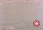 Image of Strafing Japanese targets in  Kagoshima prefecture Kagoshima Kyushu Japan, 1945, second 48 stock footage video 65675033367