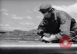 Standbild Laden von F-51 guns Korea, 1951, aus Sekunde 7 historischem Filmmaterial Videoclip 65675033388