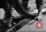 Standbild Laden von F-51 guns Korea, 1951, aus Sekunde 13 historischem Filmmaterial Videoclip 65675033388