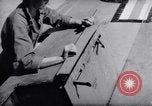 Standbild Laden von F-51 guns Korea, 1951, aus Sekunde 46 historischem Filmmaterial Videoclip 65675033388