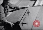 Standbild Laden von F-51 guns Korea, 1951, aus Sekunde 47 historischem Filmmaterial Videoclip 65675033388