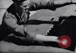 Standbild Laden von F-51 guns Korea, 1951, aus Sekunde 52 historischem Filmmaterial Videoclip 65675033388