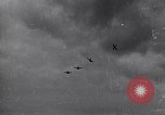 Image of P-51s of 354th Fighter Group landing Criqueville France, 1944, second 1 stock footage video 65675033408