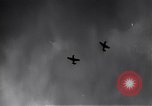 Image of P-51s of 354th Fighter Group landing Criqueville France, 1944, second 4 stock footage video 65675033408