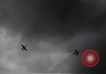 Image of P-51s of 354th Fighter Group landing Criqueville France, 1944, second 15 stock footage video 65675033408
