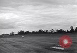 Image of P-51s of 354th Fighter Group landing Criqueville France, 1944, second 21 stock footage video 65675033408