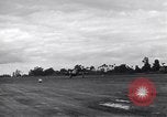 Image of P-51s of 354th Fighter Group landing Criqueville France, 1944, second 25 stock footage video 65675033408