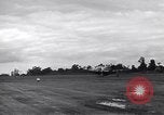 Image of P-51s of 354th Fighter Group landing Criqueville France, 1944, second 26 stock footage video 65675033408
