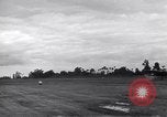 Image of P-51s of 354th Fighter Group landing Criqueville France, 1944, second 27 stock footage video 65675033408