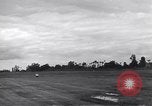 Image of P-51s of 354th Fighter Group landing Criqueville France, 1944, second 28 stock footage video 65675033408