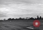 Image of P-51s of 354th Fighter Group landing Criqueville France, 1944, second 29 stock footage video 65675033408