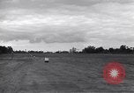 Image of P-51s of 354th Fighter Group landing Criqueville France, 1944, second 30 stock footage video 65675033408
