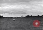 Image of P-51s of 354th Fighter Group landing Criqueville France, 1944, second 31 stock footage video 65675033408