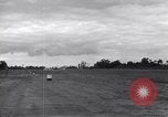 Image of P-51s of 354th Fighter Group landing Criqueville France, 1944, second 33 stock footage video 65675033408