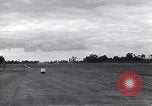 Image of P-51s of 354th Fighter Group landing Criqueville France, 1944, second 34 stock footage video 65675033408