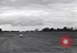 Image of P-51s of 354th Fighter Group landing Criqueville France, 1944, second 35 stock footage video 65675033408