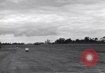 Image of P-51s of 354th Fighter Group landing Criqueville France, 1944, second 37 stock footage video 65675033408