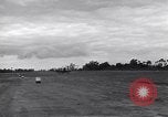 Image of P-51s of 354th Fighter Group landing Criqueville France, 1944, second 39 stock footage video 65675033408