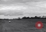 Image of P-51s of 354th Fighter Group landing Criqueville France, 1944, second 40 stock footage video 65675033408