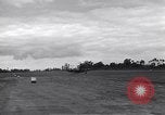 Image of P-51s of 354th Fighter Group landing Criqueville France, 1944, second 41 stock footage video 65675033408