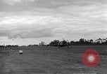 Image of P-51s of 354th Fighter Group landing Criqueville France, 1944, second 42 stock footage video 65675033408