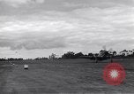 Image of P-51s of 354th Fighter Group landing Criqueville France, 1944, second 43 stock footage video 65675033408