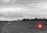 Image of P-51s of 354th Fighter Group landing Criqueville France, 1944, second 44 stock footage video 65675033408