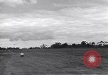 Image of P-51s of 354th Fighter Group landing Criqueville France, 1944, second 45 stock footage video 65675033408
