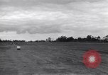 Image of P-51s of 354th Fighter Group landing Criqueville France, 1944, second 47 stock footage video 65675033408